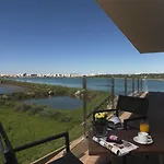 Agua Riverside فندق فيريغودو
